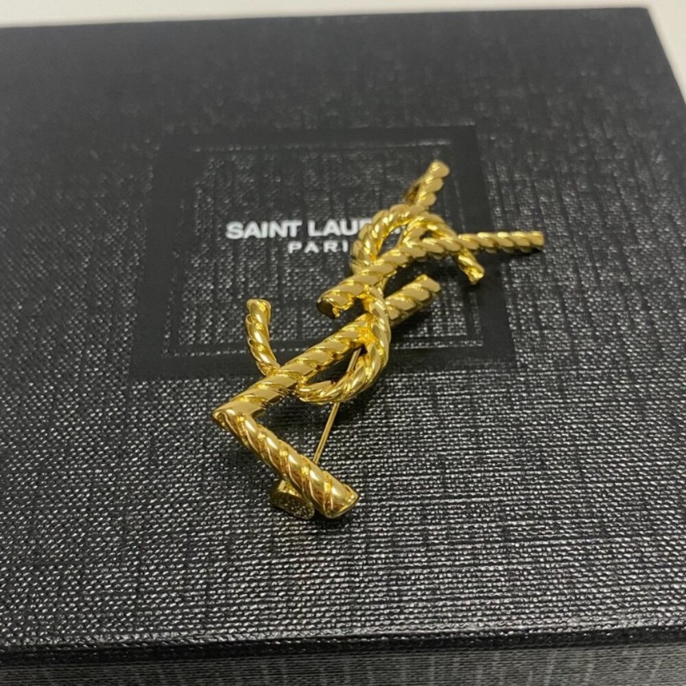 Saint Laurent Gold Saxophone Player Brooch Jewelry